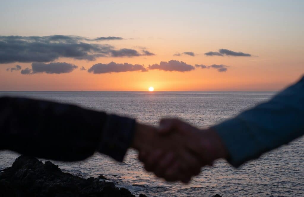 Blurred male and female hands touching each other, the concept of friendship, protection, love, help